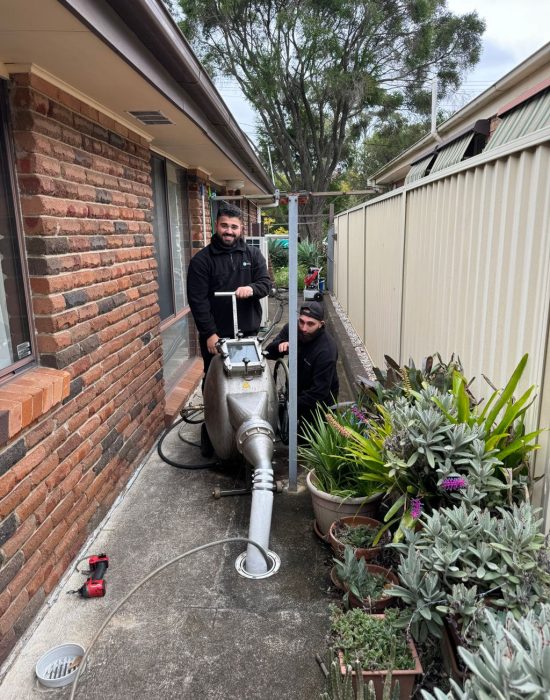 Our team using water jetting to clear out blocked drains in Sydney